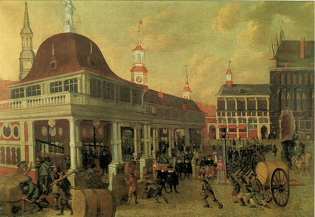 Op een druk plein is van alles te doen. Mannen vervoeren volle tonnen en balen, Het gebouw rechts heeft een overkapping en onder die overkapping zijn verschillende weegschalen te zien. Op de achtergrond twee gebouwen. Één met open luiken en het ander, hoger, met een sierlijke entree van natuursteen, maar verder vrij donker.
