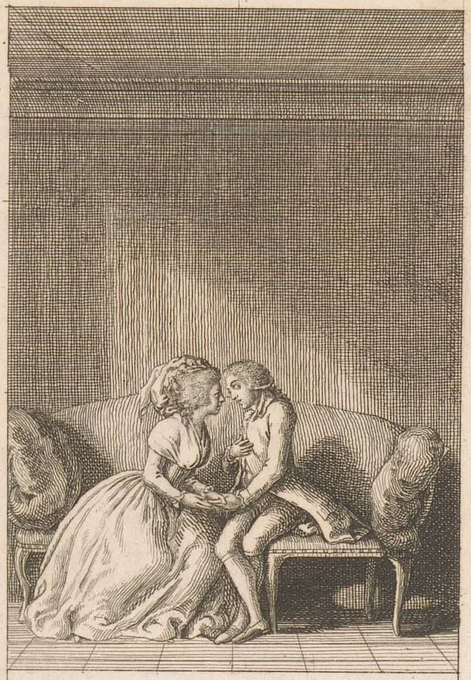 Op een sofa zitten een jonge vrouw en een jonge man naar elkaar toegebogen. Zij heeft zijn linker hand in haar beide handen, zijn rechter hand ligt op zijn borst. Ze kijken elkaar diep in de ogen.