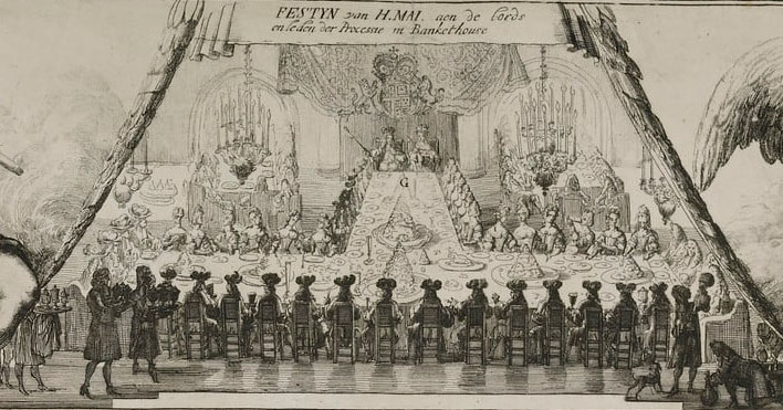 Aan een t-vormige tafel zitten allemaal dames en heren te dineren. Aan het hoofd van de tafel (voet van de T) zitten Willem en Mary. Links zitten mannen, rechts vrouwen. Aan de kop van de T zitten allemaal mannen en op de resterende plekken vrouwen. De tafel staat vol met hoog opgestapelde dissen. Voor komen bedienden met moikken binnen.