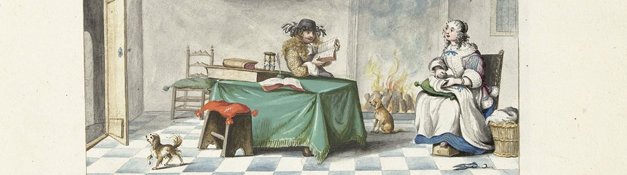 Een man leest een vrouw voor terwijl ze voor de openhaard zitten.