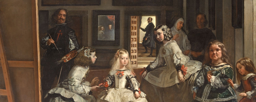 Een groep mensen in een ruimte, links de achterkant van een schildersdoek, daarnaast de schilder die naar het doek kijkt. In het midden drie meisjes, daarnaast twee kleine mensen. Op de achtergrond nog iemand in een deuropening en iemand in de schaduw. 