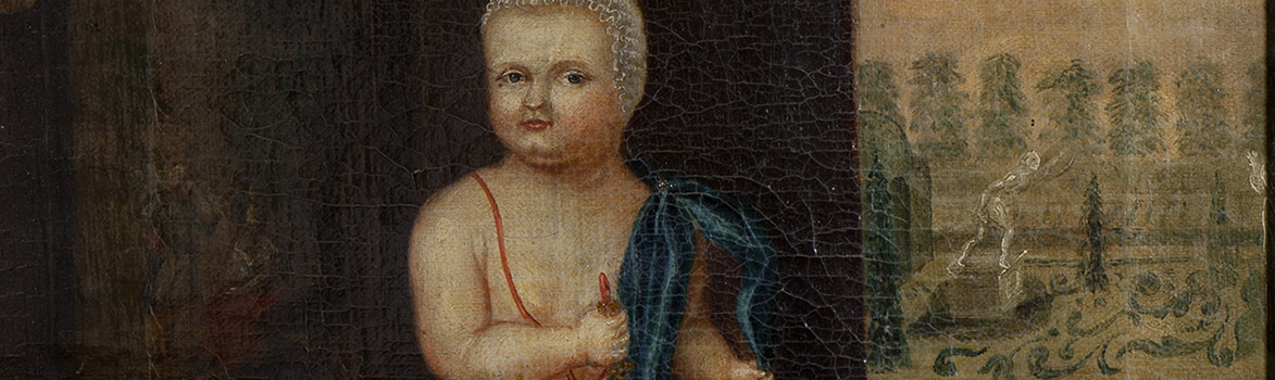 Portret van een baby naast een tuin