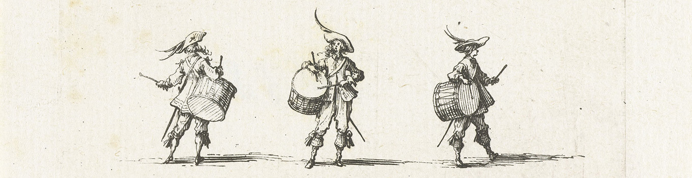 Drie trommelaars naast elkaar