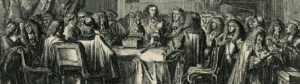 Mannen rond een tafel, in het midden staat Willem III met twee vingers in de lucht.