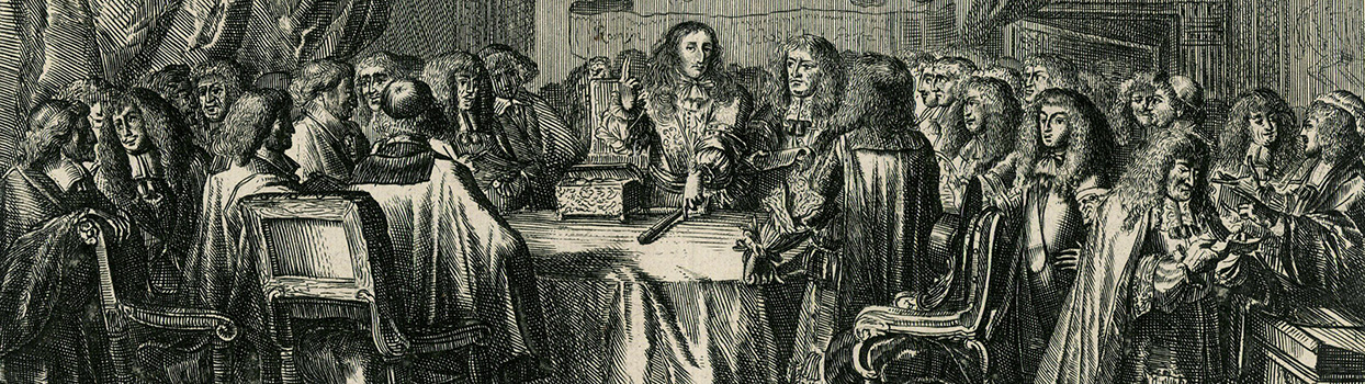 Mannen rond een tafel, in het midden staat Willem III met twee vingers in de lucht.