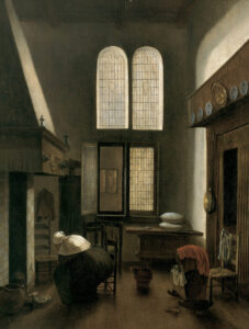 Interieur met een vrouw met zwarte jurk, wit jakje en witte kap die voorovergebogen bij een haardvuur zit Achter haar een wiegje en een stoel met daarover kleren. De stoel staat voor een bedstee met gordijnen. De ruimte is hoog met op de achtergrond een hoog dubbel raam met glas in lood.