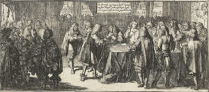 Om een lange tafel staan mannen te praten. Er liggen allemaal papieren voor ze op tafel. Om de tafel heen staan nog veel meer mannen.