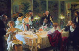 Aan een tafel zit en staat een elegant geklede groep mensen. Op tafel ligt een tafelkleed met een kantenrand. Op tafel staan lege glazen, een koffiekan en een theekan, een paar glazen fruitschalen op een hoge poot. Verder twee hoge lampen versierd met bloemguirlandes. De dames zijn gekleed in avondjurken de heren in kostuum. De muren van de eetkamer lijken op verdures in de doorgangen staan hoge planten.